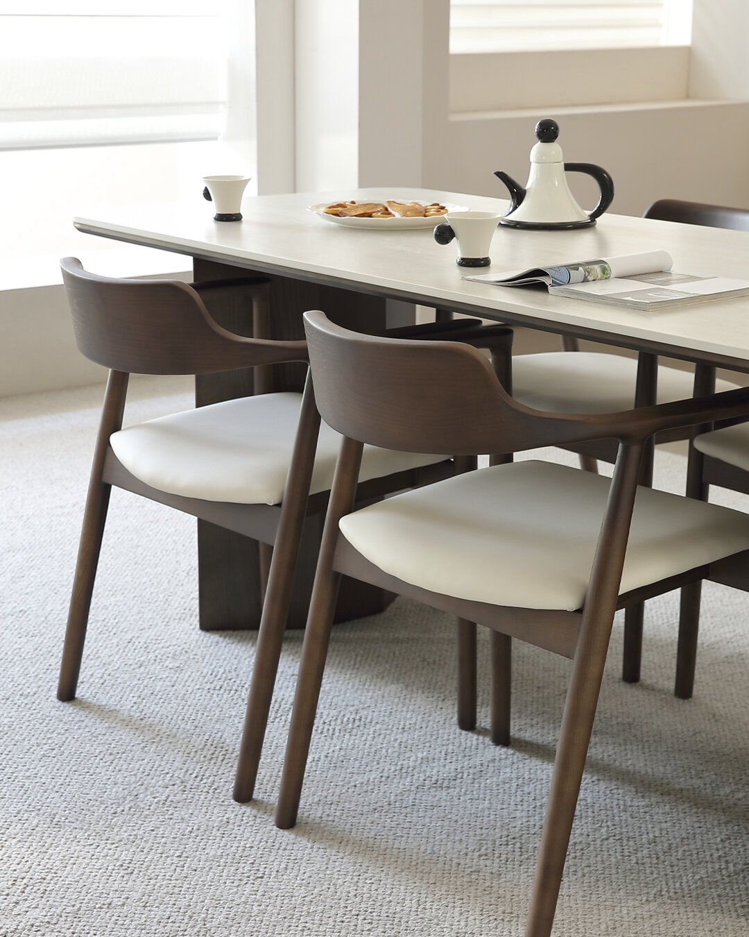 Two Arano chairs pulled in