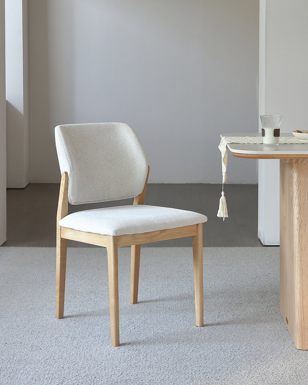 The Bianca dining chair at home, a mother and child at the table