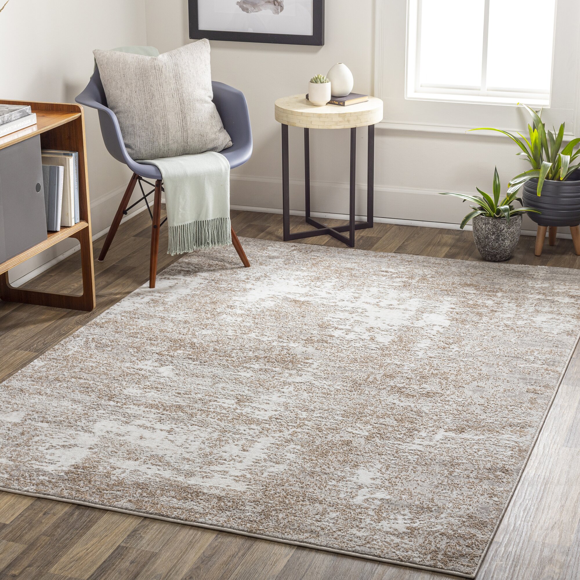 The Cosmo rug in Oatmeal, laid out in the room
